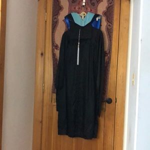 Graduation gown and cap with Masters in Education hood.